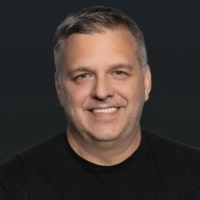 Louis Bernardi, Founder | "The Benefits Whisperer," BritePath seen wearing a blace color round neck tshirt